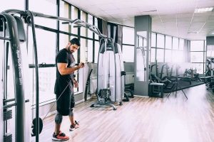 Benefits of Using a Cable Machine in a Garage Gym