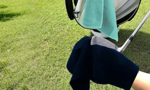 A Golf Towel Does More Than Wipe Clubs
