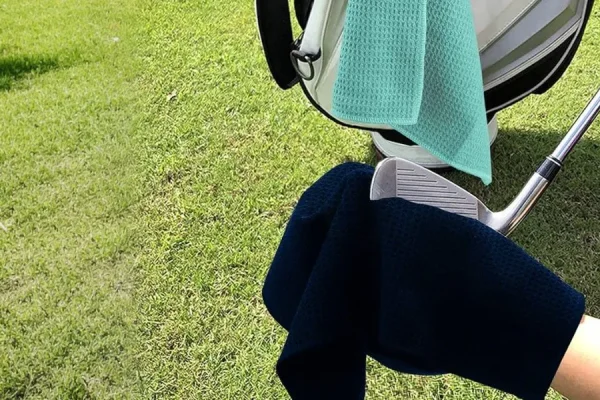 A Golf Towel Does More Than Wipe Clubs